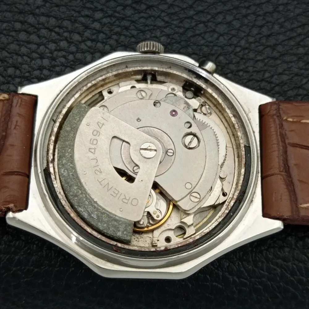 Vintage 1978 Orient Automatic Mens Silver Watch W/daydate & Gold accents